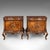 This is a pair of vintage bedside cabinets. An Italian, burr walnut bedroom nightstand in Rococo taste, dating to the late...