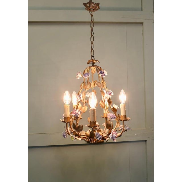 French Gilt Toleware and Floral Ceramic 6 Branch Chandelier This is a lovely old and attractive dainty piece, the open...