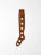 Striking antique wood sock stretcher with an elongated silhouette and seven circular cutouts. Warm aged wood and graphic...