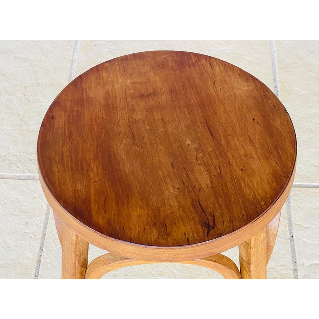 Mid-century, vintage, "Model #92" stool by Baumann, France, from the 1950's. Piece is made of beech, with a beautiful...
