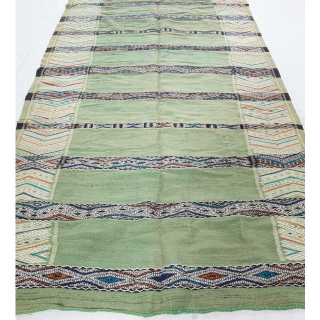 Vintage Moroccan Green Tribal Rug Size: 5'0" × 9'6" (152 × 289 cm) This is Moroccan rug a beautiful vintage piece from the...