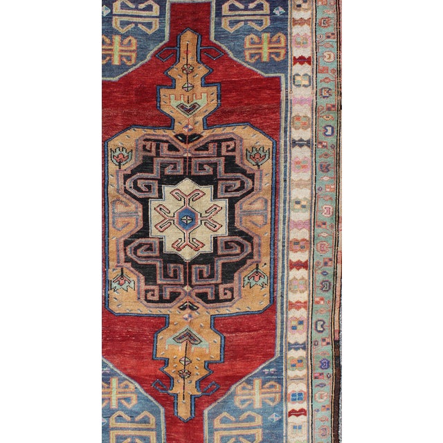 Measures: 4'4 x 8'10. Vintage Turkish Oushak Rug with Bold Red, Cobalt Blue, and Charcoal Tones. Keivan Woven Arts /...