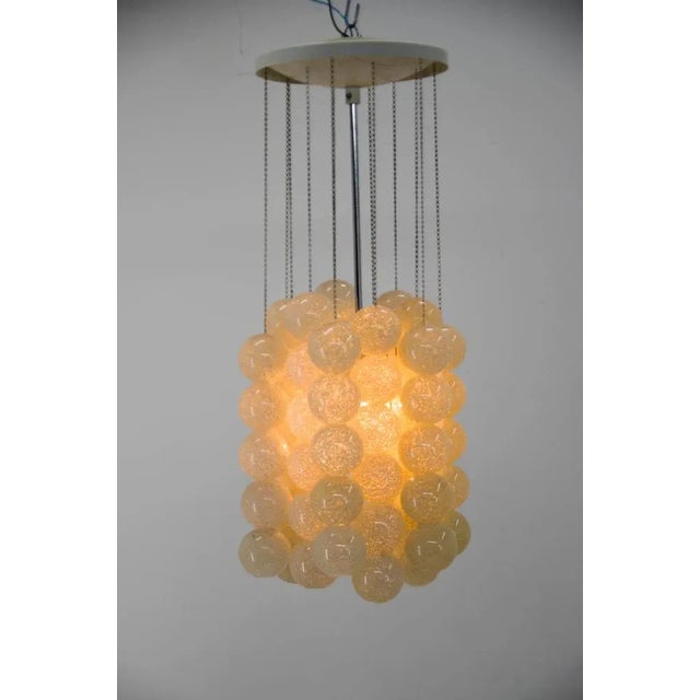 Extraordinary chandeliers by napako, czechoslovakia, 1970s, very good original condition. White metal base and resin ball...