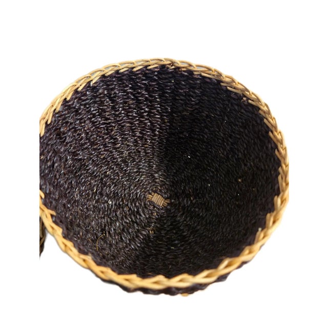 Add a touch of natural charm and rustic elegance to your home with this unique woven acorn-shaped basket. Crafted in a...