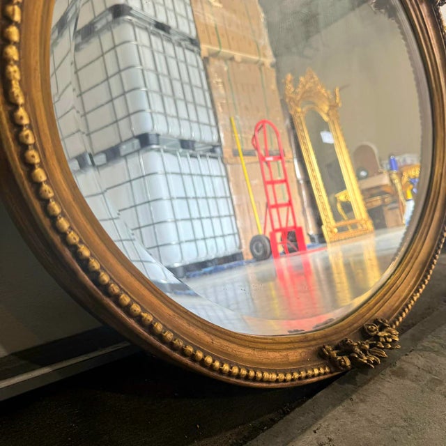 Bring timeless sophistication and European charm to your home with this elegant French-Italian style oval wall mirror....