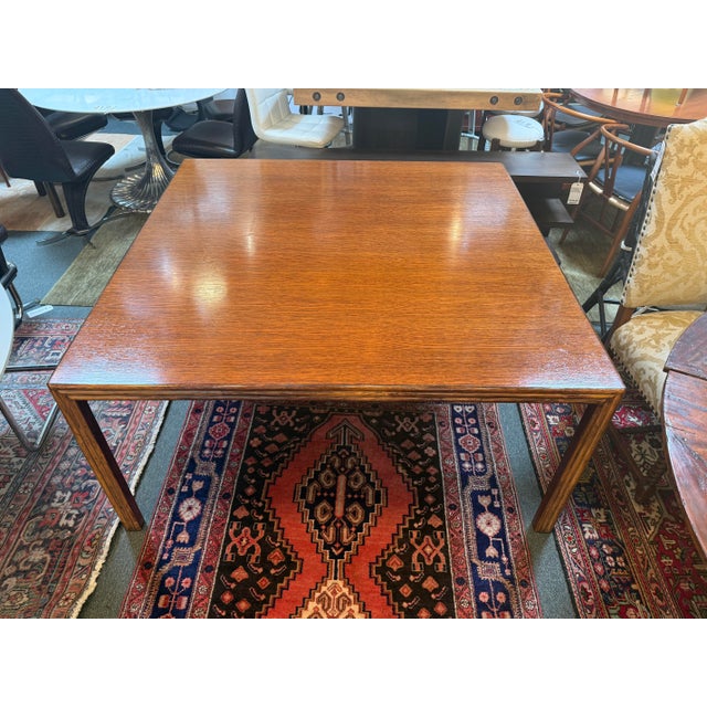 Design Plus Gallery presents a Vintage Parsons Table from McGuire Furniture. The rectangular top is bordered by reeded...