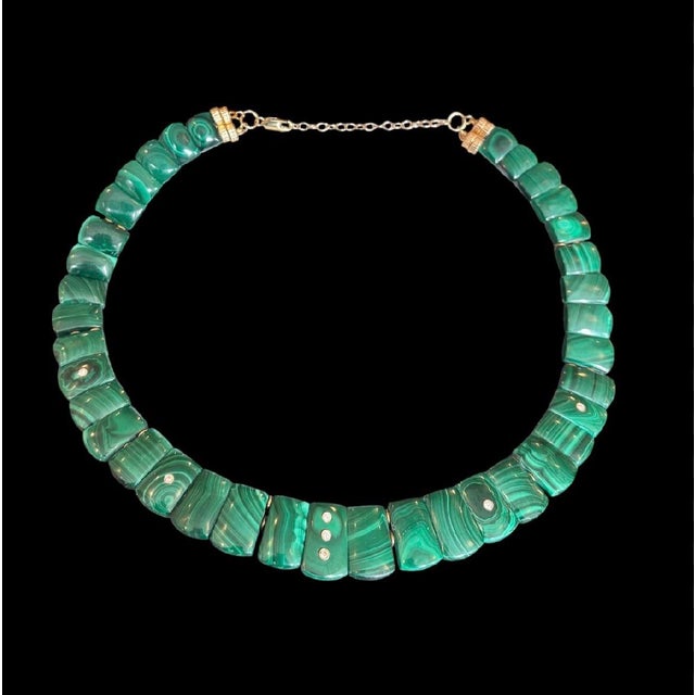 The CLEOPATRA: Malachite and Diamond Collar Malachite, Diamonds & 14k Gold What is the difference between a choker and a...