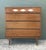 This iconic tallboy dresser by the esteemed Bassett Furniture Industries is a premier example of 1960s American Mid-...