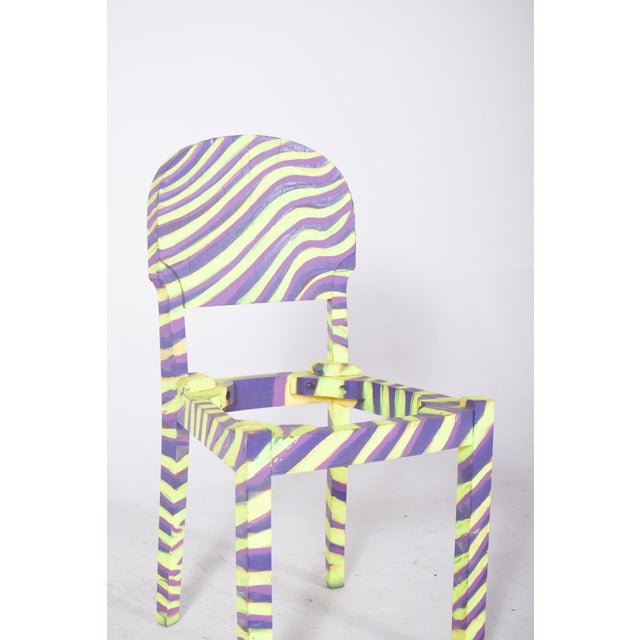 Painted dining chair, zebra design. Reinterpreted with contemporary artistic intervention, transforming an everyday object...