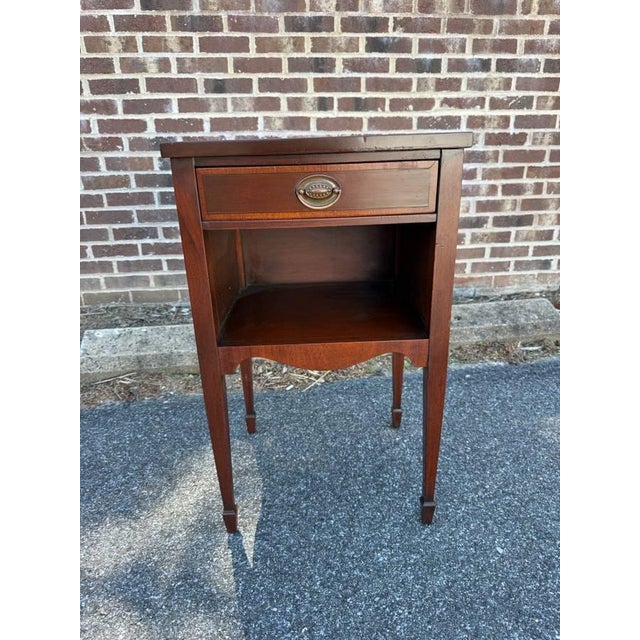 Early 20th Century Federal Style Mahogany Inlaid End Side Table. It features open compartment provides space for books or...