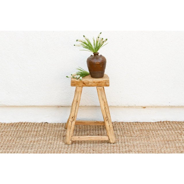 Add a touch of rustic charm with this Versatile antique Asian stool. Perfect as extra seating or a small end table, this...