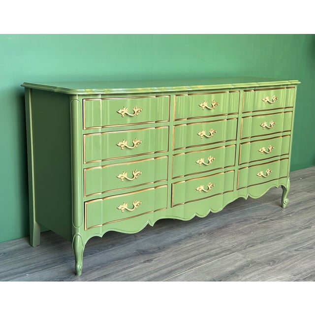 This is solid built dresser of twelve drawers with dovetail joints This dresser is newly refinished in high gloss green...