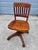 Vintage solid oak banker's or typist office chair on casters, in Gunlocke Chair Co. style. This chairs is a. sweet vintage...