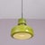 1970s hanging lamp in green glass with copper details, designed by victor berndt for flygsfors, sweden. A distinctive...