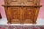 Beautiful cabinet decorated with hand carving, fluted columns, cornice molding and spice rack. The cabinet is two-part....