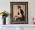 Mid 20th century decorative reproduction after Jacques-Louis David’s *Portrait of Pierre Sériziat* (1795). David was one...