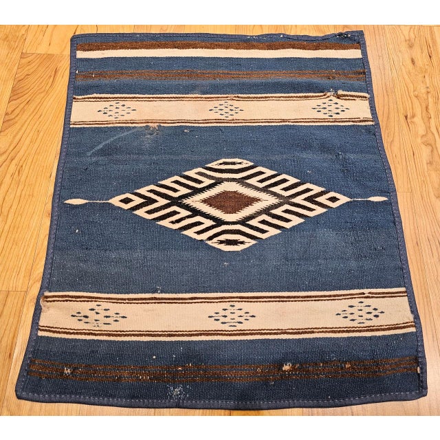 This vintage Mexican Saltillo Serape, woven in Coahuila, Northern Mexico, dates to the late 19th or early 20th century and...