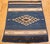 This vintage Mexican Saltillo Serape, woven in Coahuila, Northern Mexico, dates to the late 19th or early 20th century and...