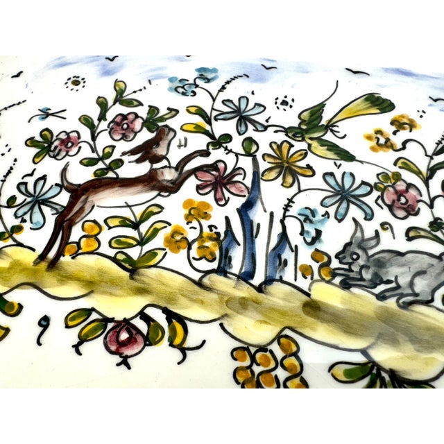 This exquisite vintage hand-painted ceramic platter by Arte Cerâmica Gimboa from Portugal showcases the vibrant artistry...