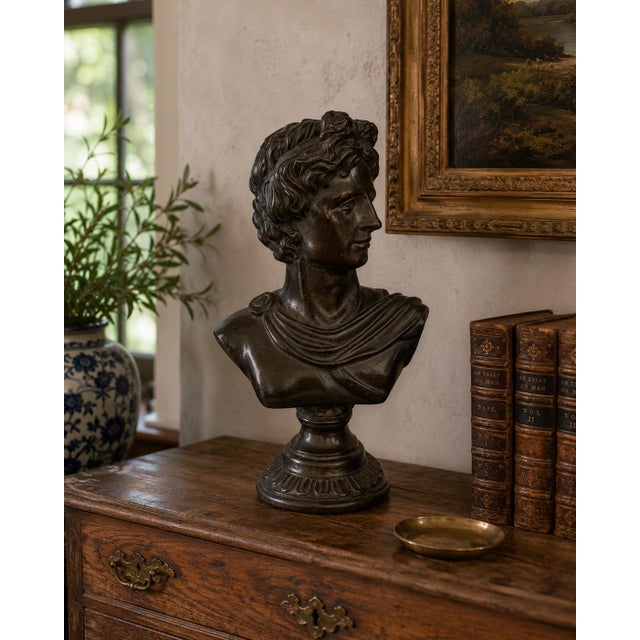 A handsome late 20th century interpretation of the Apollo Belvedere, modeled with the idealized profile, curling hair,...