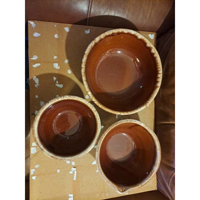 mccoy 3mixing nesting bowls vintage like new brown and tan marbeling in the glaring process.1 is a10" marked h.p. and...