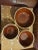 mccoy 3mixing nesting bowls vintage like new brown and tan marbeling in the glaring process.1 is a10" marked h.p. and...