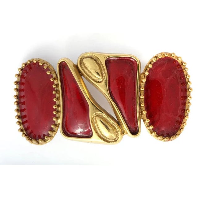 This is part of Chairish’s Costume Jewelry assortment. Beautifully made, one of a kind, brass and red enameled belt...
