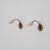 A refined pair of italian wall sconces from the 1950s, defined by a light and organic composition that combines brass and...