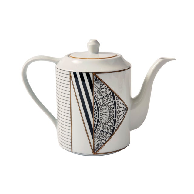 Crafted from fine porcelain, the Alina Tea & Coffee Service Set brings together three coordinating pieces defined by bold...
