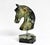 This hand-carved horse of natural emerald-bearing gemstone captures the grace and noble character of the horse in a modern...
