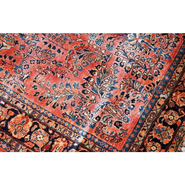 Handmade antique Sarouk rug fin original good condition. The rug has been made in the beginning of 20th century in red...