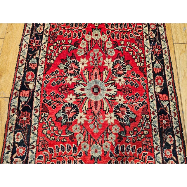 "Discover the enduring beauty and refined artistry of this exquisite Early 20th Century Vintage Persian Sarouk Lilian Long...