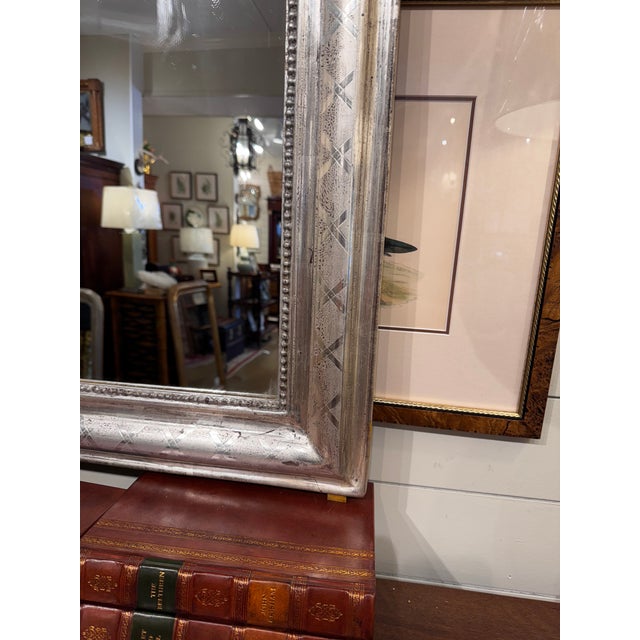 This is a gorgeous 19th century Louis Philippe Mirror! There is hand carved detail on the edges of the mirror in a simple...