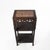 Antique Chinese carved hardwood three tier stand with inset rouge marble made in 1890-1920. This piece showcases a...
