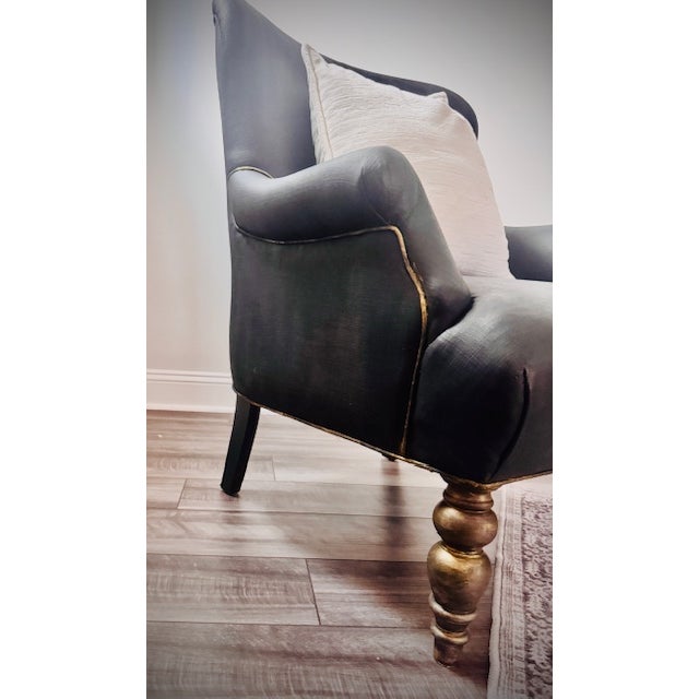 A beautifully refinished accent armchair features a sculpted wood frame painted in rich satin black with hand-applied...
