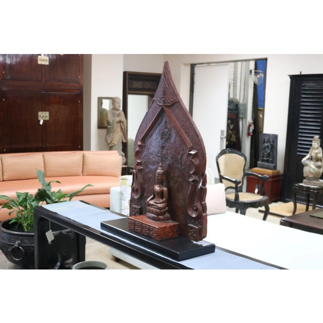 Sitting Buddha with ebonized mahogany base, Thailand 19th c. we purchased this piece in Bangkok Thailand.