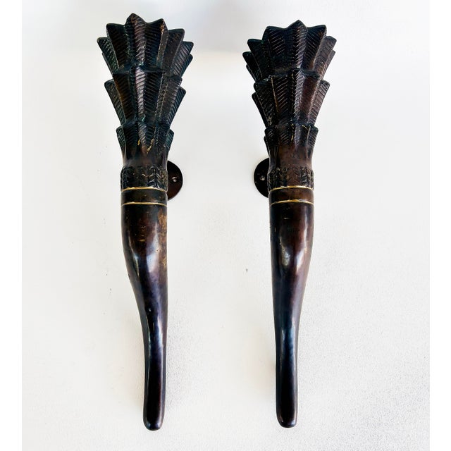 Large Bronze Horn Torch Candle Sconces with Flared Feather Tops Offered for sale is a large pair of elegant, stylized...