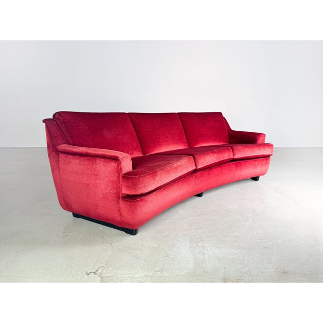 We are offering a beautiful vintage couch from the 1960s for sale. The sofa is covered with a red velvet fabric, which...