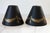 Pair of vintage tapered cone-shaped toleware metal lamp shades features a classic black finish accented with gold...
