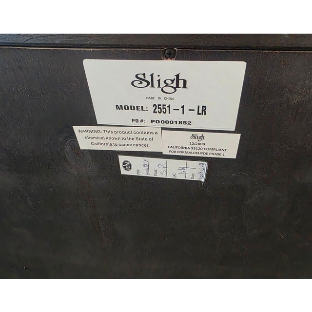 This Sligh file cabinet features a rich wood finish and detailed craftsmanship. It has 4 spacious drawers with elegant...