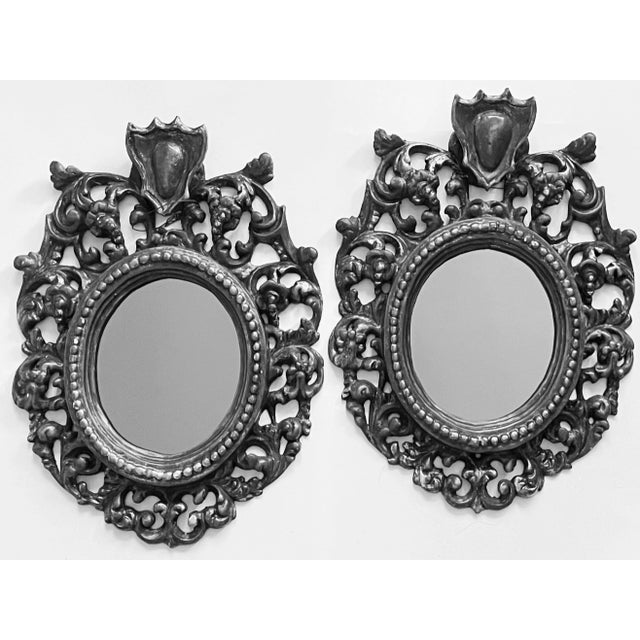 Two Super desirable mirrors From Florence, Italy. We found pair of Rococo wood silver leaf frames, from an antique shop....