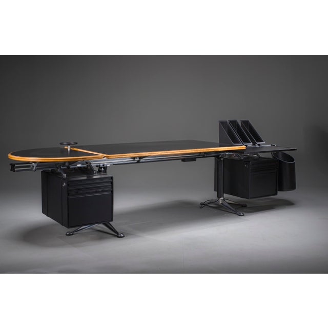 Iconic modular executive desk designed by bruce burdick for herman miller in the 1980s. Featuring a black laminate work...