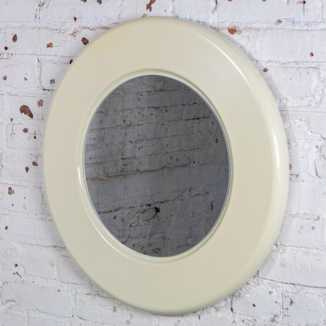 Marvelous vintage Modern wall mirror with round off-white plastic frame. Beautiful condition, keeping in mind that this is...