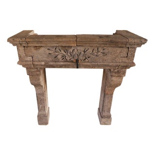 Early 20th Century French Carved Limestone Fireplace with Laurel Friezes For Sale