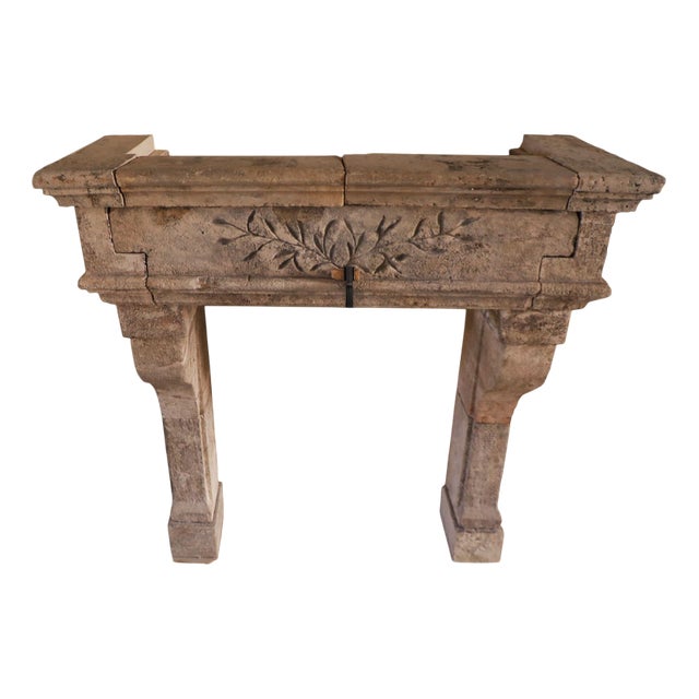 Early 20th Century French Carved Limestone Fireplace with Laurel Friezes For Sale