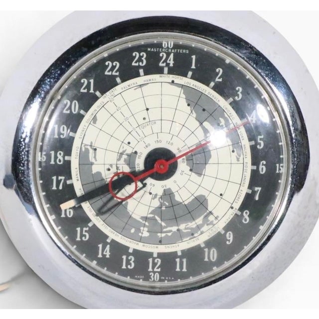 Mid Century wall clock depicting a map of the northern hemisphere - the clock is in good, original, clean and working...