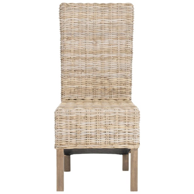 The stately side chair recasts natural rattan for contemporary homes. Legs, crafted from renewable mango wood with antique...