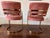 A pair of vintage Cal-Style Furniture Mfg. Co. cantilever armchairs from the 1980s. The sculptural brass-plated frames...