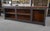 Antique 1930s fir shop counter, elm burl top, shell handles and metal label holders.