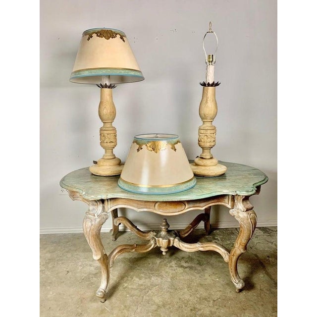 Pair of custom lamps made with a pair of 19th century hand carved Italian candlesticks wired into lamps and crowned with...